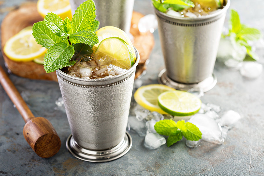 Classic mint julep cocktail with lime and lemon