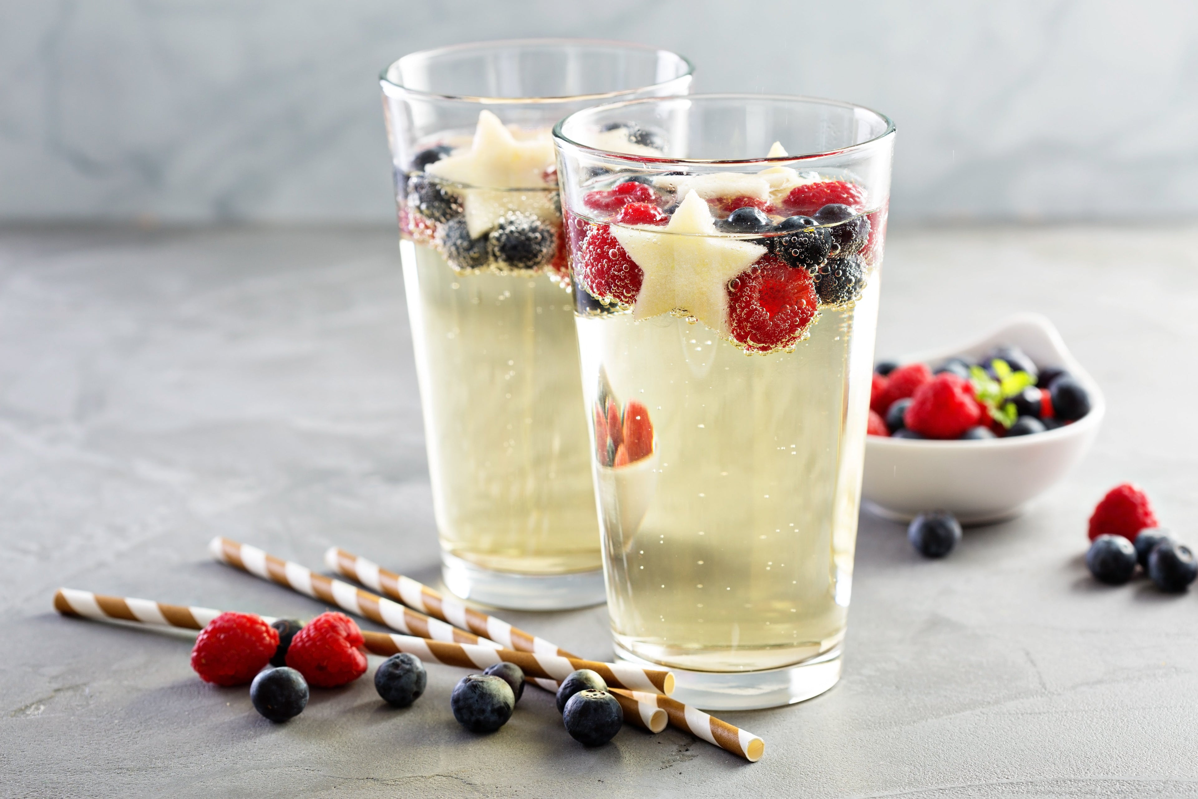 Red, blue and white sangria with sparkling wine