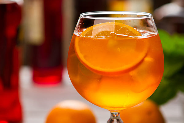 Spritz Cocktail with an orange slice.